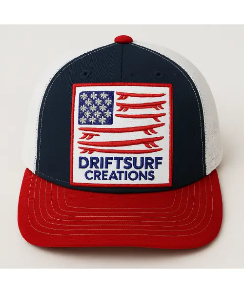 A red, white, and blue trucker hat with a patriotic design and 'Driftsurf Creations' logo.